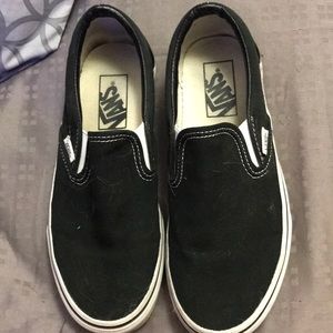 Black slip-on Vans
